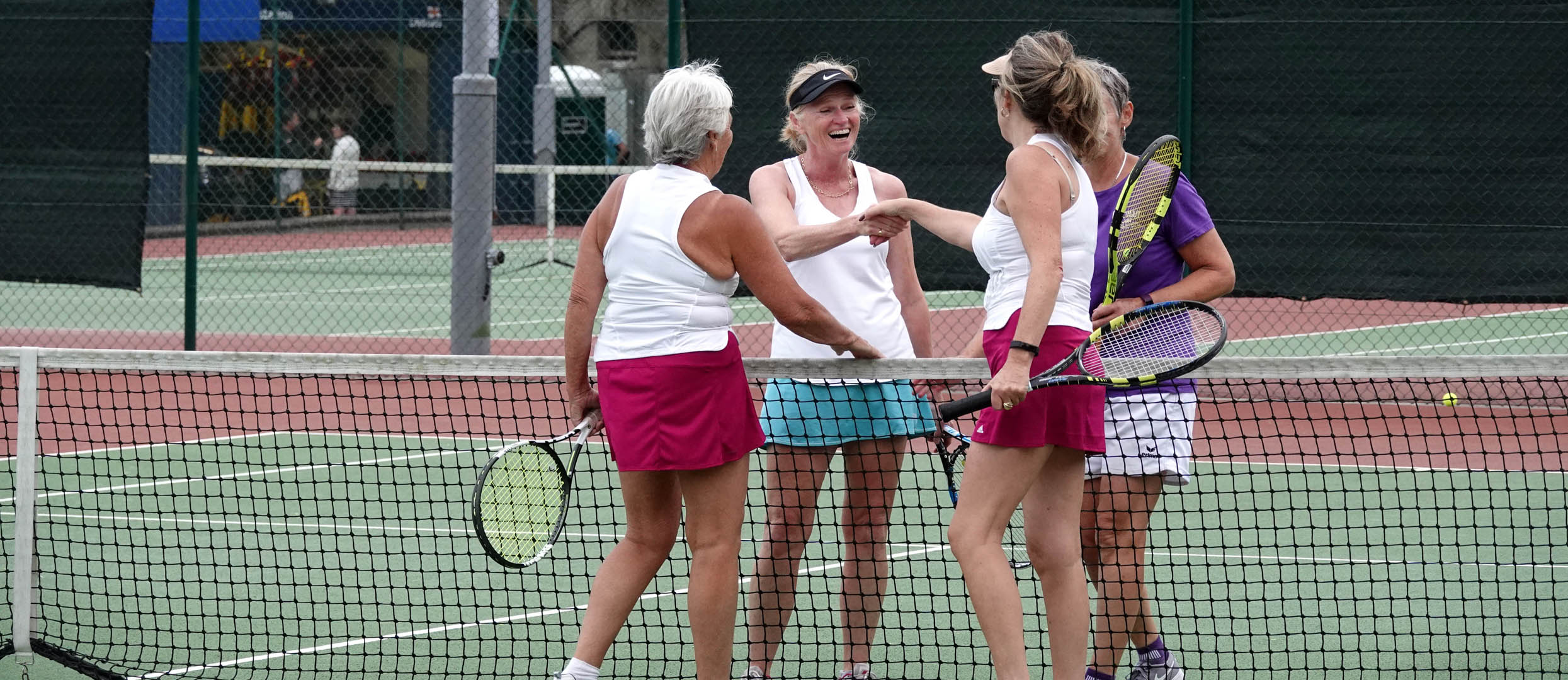 Players on court during Wednesday Afternoon social tennis